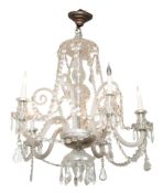 A glass five light chandelier in Regency style,