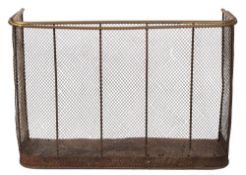 A Victorian brass and wire mesh nursery fender, late 19th century; of rectangular form,