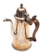 A Queen Anne silver chocolate pot, tapering circular form, with a wooden scroll handle,