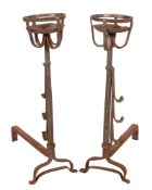 A pair of wrought irons fire dogs, in 16th century taste,