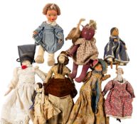A wax head doll, (damaged) ,together with a collection of various later dolls.