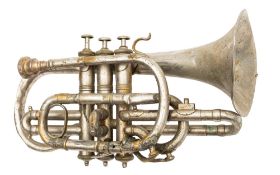 An Italian brass side-action radial value trumpet and a French silver plated cornet (2)