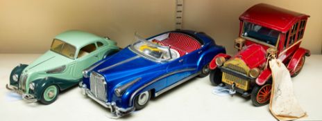 A Schuco clockwork tinplate BMW 327, two-tone green,