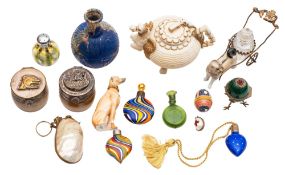 A mixed group of glass and ceramic scent bottles and atomisers including a Lalique example