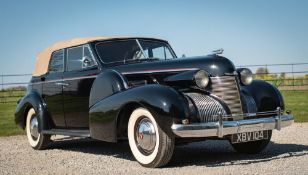 A 1939 Cadillac Series 61 4-Door Convertible Sedan;