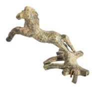 A ROMAN BRONZE HORSE ATTACHMENT CIRCA 2ND CENTURY A.D.,