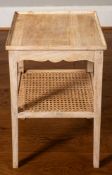 A bleached and caned wood etagere, 20th century; of square section,