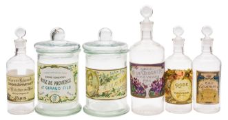 A small group of apothecary and other shop display jars, primarily glass,