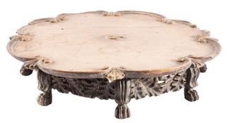 A Regency or George IV carved oak lazy Susan,