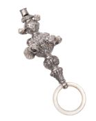 An Edwardian silver child's rattle, baluster form, with a whistle terminal, embossed decoration,