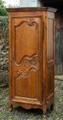 A French oak armoire in 18th century taste,