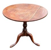 A George III mahogany tripod table,