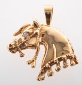A diamond horse head pendant, a carved horse head pendant,