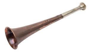 A silver plate and copper hunting horn by Kholer & Son, 25cm long.