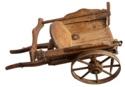 An early 20th century scale model of a hay cart,