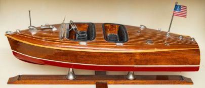 A scale model of a Riva Aquarama 48cm long