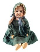 A Guido Knauth bisque head doll, blonde wig, blue glass sleeping eyes,