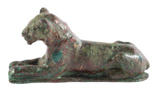 A ROMANO-EGYPTIAN BRONZE MODEL OF A RECUMBENT LION,CIRCA 2ND CENTURY A.D., 5.4cm.