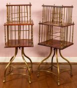 A matched pair of late Victorian brass and walnut three-tier revolving bookstands,