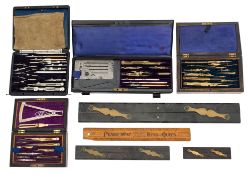 A collection of cased draughtsman's implements,