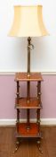 A stained hardwood and brass mounted three-tier lamp table,