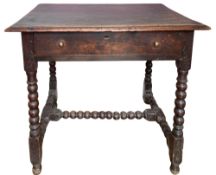A William & Mary oak side table, late 17th Century; the rectangular top with moulded edges,