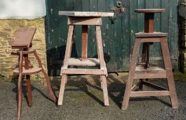Three various artist's adjustable wooden sculpting stands,