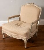 A carved and painted wood and upholstered fauteuil in Louis XV taste,