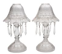A pair of 20th century clear glass table lustres with domed cover, hung with pendants and prisms,