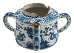 A Dutch Delft posset pot painted in blue in the Chinese manner with panels depicting a scholar