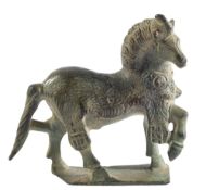 A ROMAN BRONZE MODEL OF A HORSE WITH LIONSKIN, CIRCA 2ND CENTURY A.D.