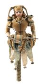A late 19th/early 20h century bisque head musical Jester doll,
