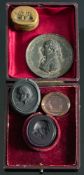 Admiral Lord Nelson .A 19th century purple oval glass intaglio seal with portrait of Lord Nelson,