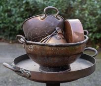 A small collection of 19th century copper and brass vessels; comprising two colanders,