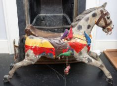 A late 19th/early 20th century carousel horse, painted face with iron bit to mouth,