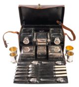 A silver plated metal, glass and leather cased picnic set, by CLARK, 53 CONDUIT STREET, LONDON,
