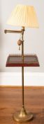 A brass and mahogany standard lamp,