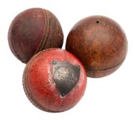 An early 20th century brown leather string box in the form of a cricket ball,