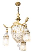 A gilt brass and cut glass four light electrolier,