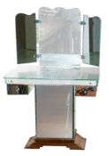 A mirrored glass on hardwood dressing table,