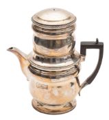 A George III silver coffee percolator, in two sections, of circular form, with ovulu borders,