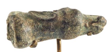 AN ORDOS BRONZE FINIAL CAST AS A DEER'S HEAD, CIRCA 4TH CENTURY B.C., 4cm. long