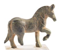 A ROMAN BRONZE MODEL OF A HORSE, CIRCA 1ST-2ND CENTURY A.D.