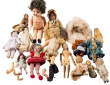 A collection of early 20th century and later dolls.