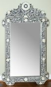A Middle-Eastern bone marquetry and hardwood framed wall mirror; modern;