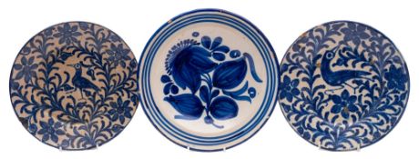 Seven faience pottery and related plates variously decorated, 19th century and later,
