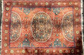 A Persian part silk carpet,