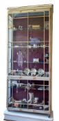 A pair of grey painted, parcel gilt and glazed display cabinets, in Louis XVI taste,