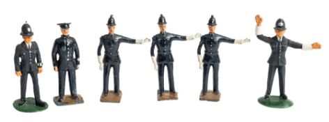 Britian's and others, a group of six die cast figures of policemen,