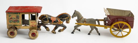 MARX Toys, a clockwork tin plate Toyland's Farm Products milk wagon with horse,